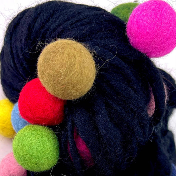 Black Handmade Thick and Thin Wool Felt Ball Yarn by Darn Good Yarn sold by Lift Bridge Yarns