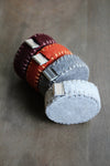 Burgundy Hand-Stitched Woolen Tape Measure by NNK Press sold by Lift Bridge Yarns